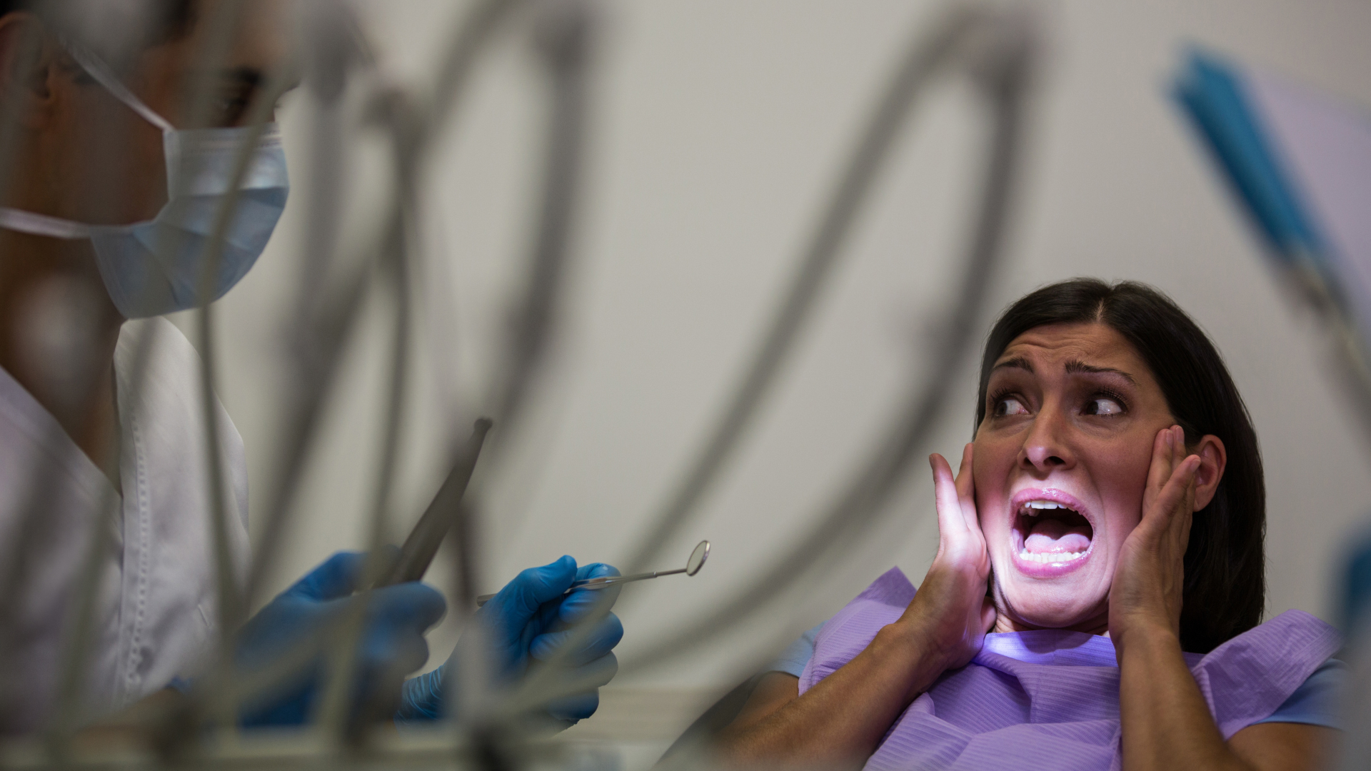 female-patient-scared-during-dental-check-up